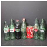 Coca-Cola Bottles and Can