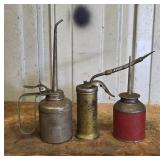 Three Metal Oil Cans