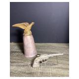 Metal Pistol And Eagle-Bell Figurines