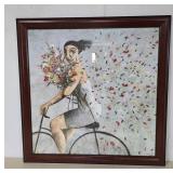 Framed Art of Woman on Bicycle