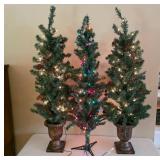 Pre-Lit Artificial Trees With Decorative Bases