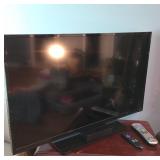 Flat-Screen Television With Accessories