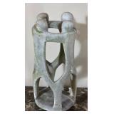 Carved Stone Sculpture With Connected Figures