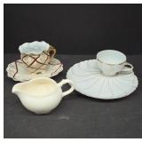 Porcelain Cups, Saucers, and Creamer
