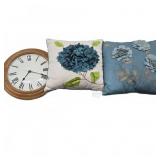 Box With Wall Clock and Decorative Pillows