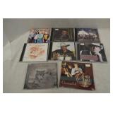 8 Assorted CDs