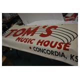 Toms Music House canvas sign