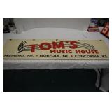 Tom's Music House canvas sign