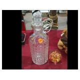 PAPER WEIGHT AND GLASS BOTTLE