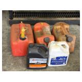 LOT OF GAS CANS AND BAR & CHAIN OIL