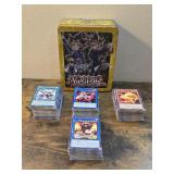 YU0GI-OH CARDS AND TIN