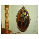 Oval, gilt, wall mirror