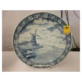 Large, blue, and white Delft charger depicting a