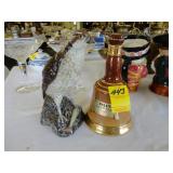 Bells decanter along with an Osprey decanter