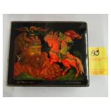Russian, black lacquer box depicting a