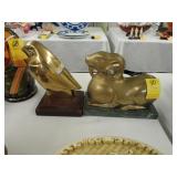 Brass figure of a ram and another of a bird