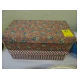 Two boxes of collectible clothing buttons