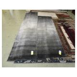 Two contemporary grey runners, 2'5' x 8', and
