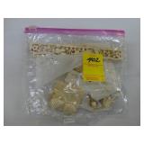 Bag of various carved pieces, including small