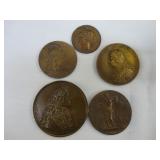Bag containing various French bronze medallions