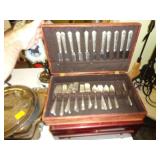 Box containing silver plated flatware along with