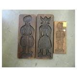Three carved, wooden, cookie molds
