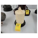 Carved, lidded jar on stand