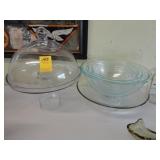 Covered cake pedestal, Pyrex mixing bowls and a