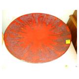 Large, red, decorative charger