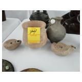 Four pieces of ancient pottery, including two oil
