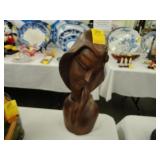 Carved wooden Polynesian figure of a young girl