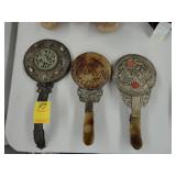 Three jade hand mirrors