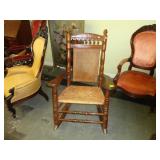 Large, Eastlake rocking chair with cane back and