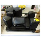 Samsung DVD player, speakers and a Garmin GPS