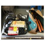 Green bag of hand tools, along with a Black and