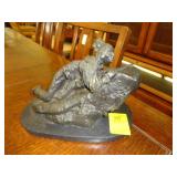 Bronze statue of an American Indian, signed C.