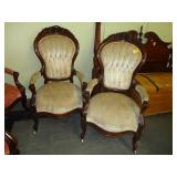 Pair of highly carved Victorian armchairs with