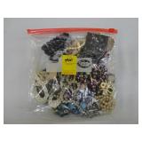 Bag of various costume jewelry, including blue
