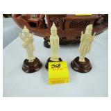Three hand carved statues of Hindu gods, Shiva,