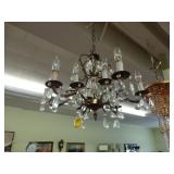 Twelve light bronze and crystal chandelier