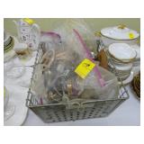 Metal crate containing various costume jewelry