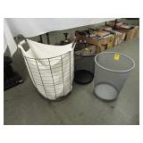 Metal laundry baskets along with two metal waste