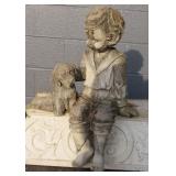 Young Boy Sitting With Puppy Concrete Statue