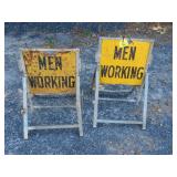 Men Working Road Signs