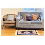 Sofa, Chair, Pillows And Area Rug