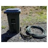 Trash Can and Garden Hoses