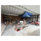 Contents Of Carport With Riding Mowers