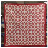 Red And White Hand Stitched Quilt