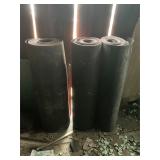 Three Rolls of Roofing Material
