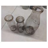 Three Glass Milk Bottles